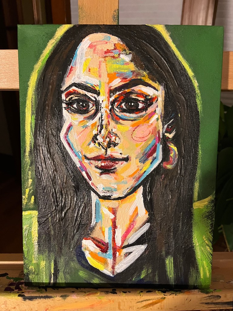Painting of a woman's face, dark hair and dark eyes with green backdrop